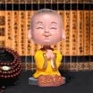 Boliliang car decoration jewelry vibrating car car shaking head small monk car interior decoration car decoration supplies creative cute cartoon gifts laughing mouth often open
