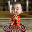 Guangshunfa creative car decoration car decoration office decoration car ornaments shaking head small monk car ornaments cartoon car decoration products wish to become