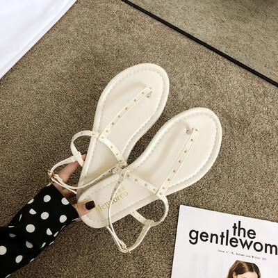 Summer Roman Pin-toed Rivet Flat-soled Sandals Lady with Baitao Beach Fairy Wind Sandals
Summer Roman Pin-toed Rivet Flat-soled Sandals Lady with Baitao Beach Fairy Wind Sandals