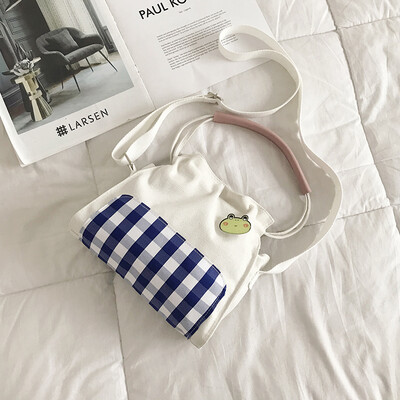 Cartoon cute shoulder bag 2019 new style plaid portable canvas bag wild fairy slant bucket bag
Cartoon cute shoulder bag 2019 new style plaid portable canvas bag wild fairy slant bucket bag