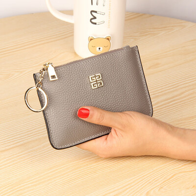 The first layer of cowhide Europe&the United States big ladies leather short paragraph purse zipper mini lychee with ring key bag
The first layer of cowhide Europe&the United States big ladies leather short paragraph purse zipper mini lychee with ring key bag