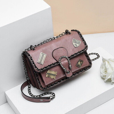 Retro spring&summer tide woman hand-held retro badge 100 lap rivets chain single shoulder oblique satchel bag
Retro spring&summer tide woman hand-held retro badge 100 lap rivets chain single shoulder oblique satchel bag