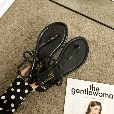 Summer Roman Pin-toed Rivet Flat-soled Sandals Lady with Baitao Beach Fairy Wind Sandals
Summer Roman Pin-toed Rivet Flat-soled Sandals Lady with Baitao Beach Fairy Wind Sandals