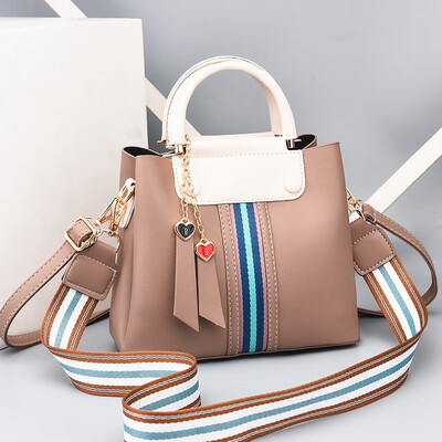 Baggage ladiesnew fashionable Korean version of Baitao ladies collision color bucket bag with one shoulder straddle handbag
Baggage ladiesnew fashionable Korean version of Baitao ladies collision color bucket bag with one shoulder straddle handbag