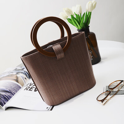 2017 summer new Korean version of the straw wrapped wood ring handbag simple shoulder bag large capacity package
2017 summer new Korean version of the straw wrapped wood ring handbag simple shoulder bag large capacity package