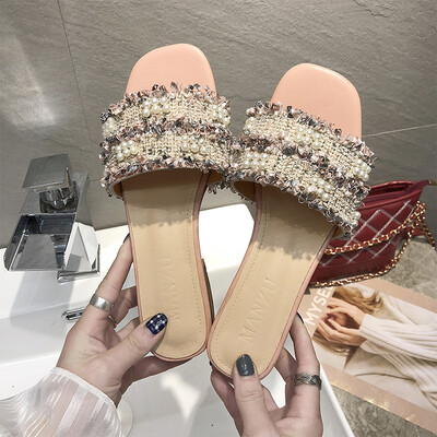Slipper female cute ins2019 summer new Korean version of wild beaded drag fashion fairy sandals
Slipper female cute ins2019 summer new Korean version of wild beaded drag fashion fairy sandals