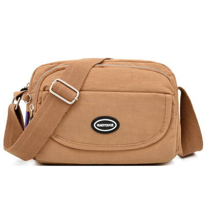 Leisure shoulder bag waterproof slung wallet portable multilayer nylon canvas bag mother bag
Leisure shoulder bag waterproof slung wallet portable multilayer nylon canvas bag mother bag