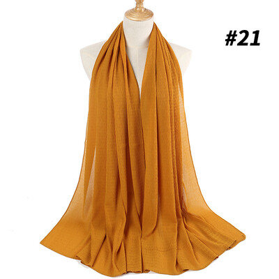 Monochrome pleated pearl chiffon national womens headscarf new 22 color Muslim solid color hijab manufacturers
Monochrome pleated pearl chiffon national womens headscarf new 22 color Muslim solid color hijab manufacturers