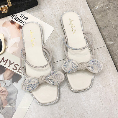 Korean version of womens shoes in summer diamond bow flat-bottomed fairy wind fashion sandals worn by women
Korean version of womens shoes in summer diamond bow flat-bottomed fairy wind fashion sandals worn by women