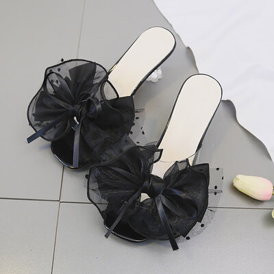 Summer transparent slipper women wear the Korean version of fashion wave point fairy wind bow a drag with cool drag
Summer transparent slipper women wear the Korean version of fashion wave point fairy wind bow a drag with cool drag
