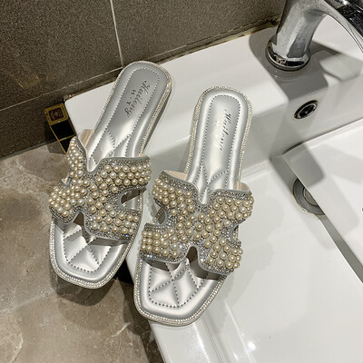 Sandals women wear summer fairy wind Joker Pearl rhinestone drag fashion H drag
Sandals women wear summer fairy wind Joker Pearl rhinestone drag fashion H drag