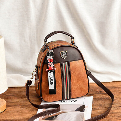 Send pendants shoulder bag female new wave Korean version of fashion wild bag travel PU small backpack female bag
Send pendants shoulder bag female new wave Korean version of fashion wild bag travel PU small backpack female bag