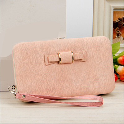 The new solid color wallet in the long section of the multi-card phone bag bowknot lunch box female package tide
The new solid color wallet in the long section of the multi-card phone bag bowknot lunch box female package tide