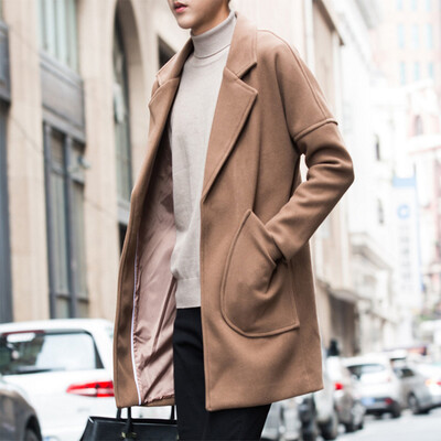 2017 Hong Kong wind autumn and winter long paragraph loose woolen coat sleeves sleeves solid color lapel coat coat
2017 Hong Kong wind autumn and winter long paragraph loose woolen coat sleeves sleeves solid color lapel coat coat