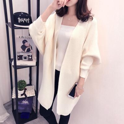 

The 2018 autumnwinter new medium&long knitted cardigan womens thick sweater overcoat is draped over the womens dress