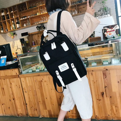 

Large-capacity school bag female 2019 new Korean version of the fashion contrast color casual canvas bag wild campus backpack