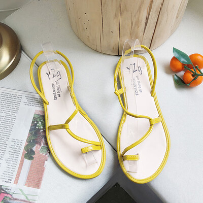 

Sandals female Xia flat-soled students simple set of toes Korean version 100 soft sister beach vacation Roman shoe girl