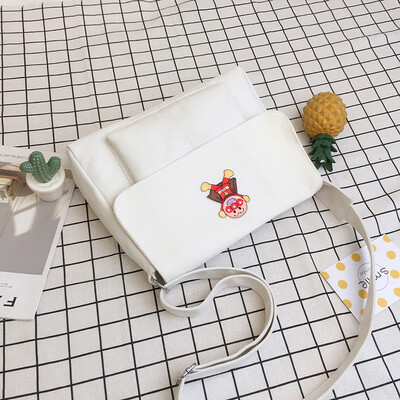 

Ins summer on the new canvas bag female messenger bag ancient feeling girl college students Korean version of single shoulder Japa