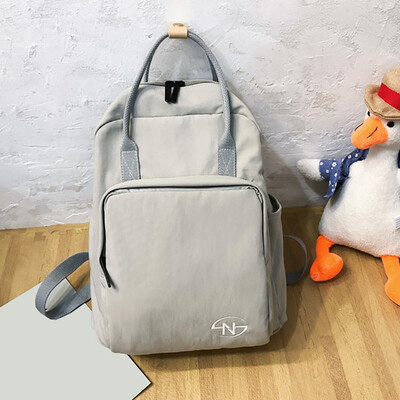 

Tailored Fashion Women Nylon Solid Color Capacity Student Backpack Travel Couple Bag