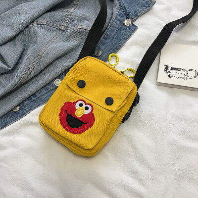 

2019 new cute cartoon simple wild shoulder Messenger bag female casual fashion ugly cute Sesame Street canvas bag