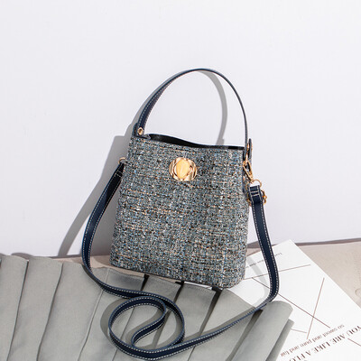 

Shangxin Little Girl Fashion Korean Version Baitao Girl Single Shoulder Bag Fashion Bucket Air Bag