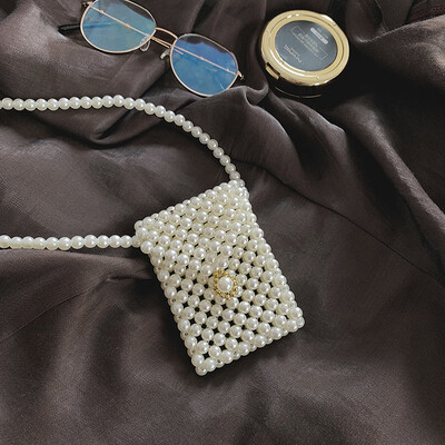 

Qiao Bani 2019 new Korean Bohemian fashion handmade pearls hand strap shoulder diagonal trend handbags