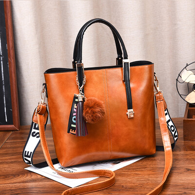 

Handbag female fashion large capacity mother retro single shoulder simple oblique shoulder texture commute tot bag
