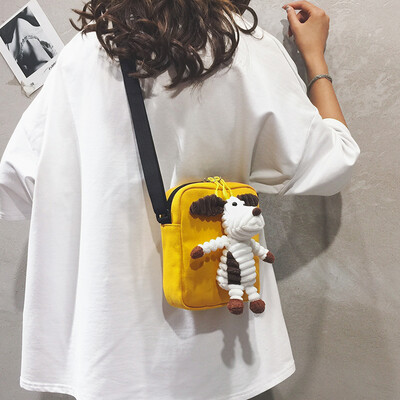 

Childrens small bag female 2019 new cartoon cute doll Messenger bag Korean version of the wild canvas shoulder mini bag