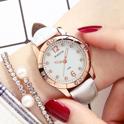 

Watch female Korean version of simple fashion waterproof high school student belt luminous rhinestone cute fashion watch quartz wa