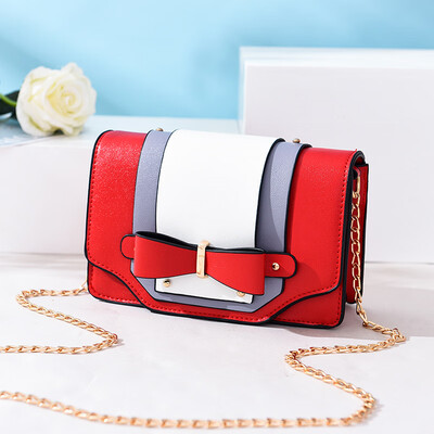 

New macarons contrast color chain handbags sweet girl bow small square bag diagonal shoulder Korean version of the bag