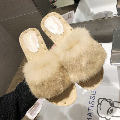 

Slippers woman Qiu Han version 100 hair slippers women wear flat-bottomed rabbit hair word drag