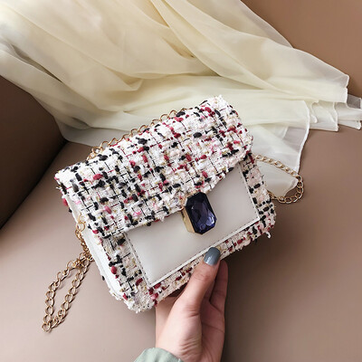

Fashion wild personality shoulder bag female 2019 new simple contrast color line woven bag temperament chain Messenger bag