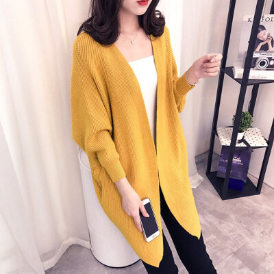 

The 2018 autumnwinter new medium&long knitted cardigan womens thick sweater overcoat is draped over the womens dress