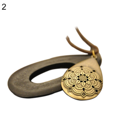 

Women Vintage Hollow Carving Waterdrop Wood Velvet Rope Sweater Necklace Jewelry