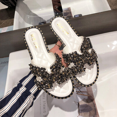

Wind slippers of INS port wear Korean version of H-slipper rivet flat sole shoes in summer