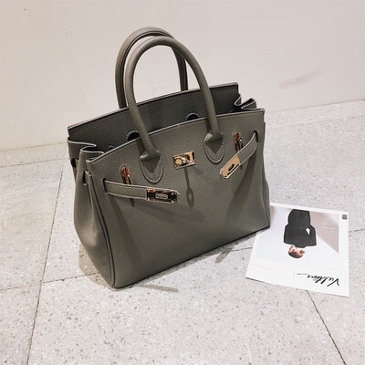 

Qiao Bani 2019 new European&American style fashion best selling lychee silk scarf platinum bag hand shoulder diagonal female bag
