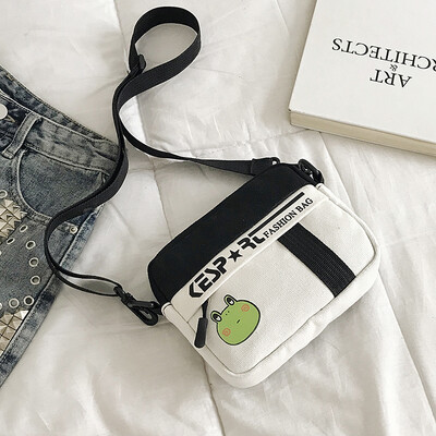 

Fashion personality letter Messenger bag 2019 new casual wild color collision shoulder bag female cartoon cute canvas bag