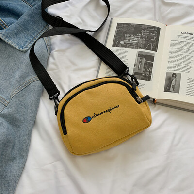 

Fashion sports simple versatile canvas bag female 2019 new casual temperament personality letter shoulder Messenger bag