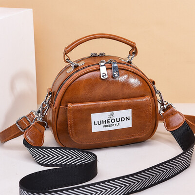 

Summer Chaozhou small round bag Korean version Baitao wide shoulder strap inclined bag fashion leisure ladies handbag
