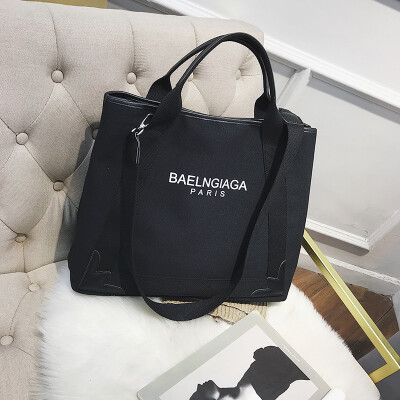 

Qiao Bani 2019 new Korean chic sleek minimalist canvas hit color bag shoulder bag diagonal cross tide handbag