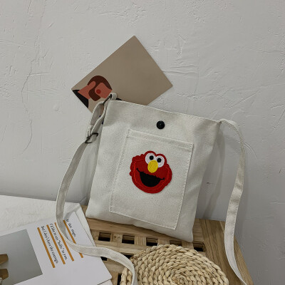

2019 new casual fashion ugly sesame street canvas bag female cute cartoon simple versatile shoulder Messenger bag