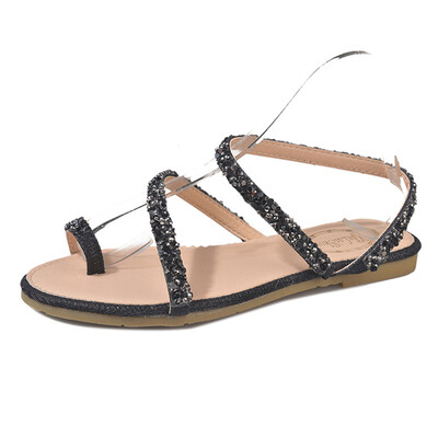 

Chic sandals female Xia Han version flat-bottomed Roman students wearing diamonds simple proto fairy shoes