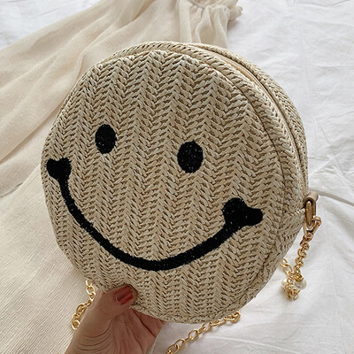 

Women 2019 spring&summer new Chaohan version of smiling face bag round straw bag single shoulder slanted womens bag beach bag