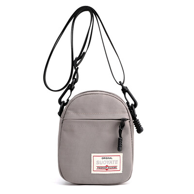 

Candy-colored mini-shoulder bag Korean version fashion pocket pocket bag with all sets of vertical mobile bag inclined canvas
