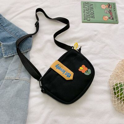 

Small bag canvas bag womens shoulder Messenger bag college students color Joker Korean version of the ancient feeling girl ins Se