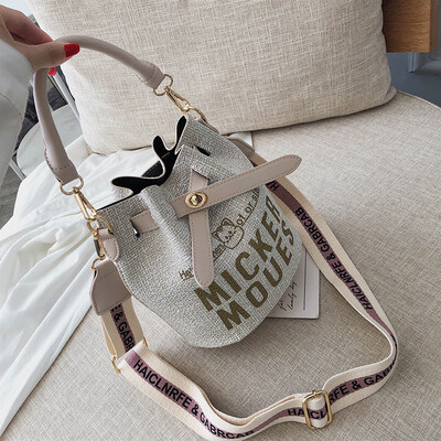 

Senior sense bag female 2019 new Korean fashion texture retro wild wide shoulder strap shoulder slung bucket bag