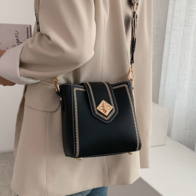 

Small bag female 2019 autumn new Korean version of the wide shoulder strap shoulder Messenger bag fashion net red wild bucket bag