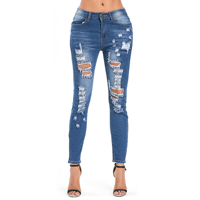

Slim Fitted High Rise Distressed Jeans