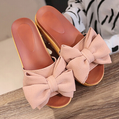 

Slipper female summer wearing a beach bow a word tow woman high-heeled beach shoes anti-slip thick sole cool drag