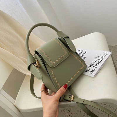

Qiao Bani 2019 new South Korea ins fashion embroidered line hit color geometry bag hand shoulder diagonal cross-trend handbag